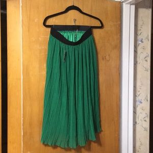 Green chiffon (polyester) kneelength pleated skirt